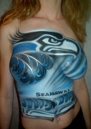 Photo by Swingtastic Toys with the username @swingtastic,  January 17, 2016 at 6:10 PM and the text says 'Panthers vs Seahawks? #nfl  #playoffs  #seattle  #seahawks  #carolina  #panthers  #bodypaint'