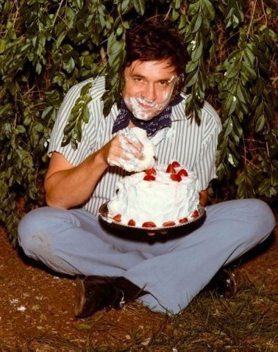 Photo by Swingtastic Toys with the username @swingtastic,  August 23, 2015 at 5:45 PM and the text says 'Hello, I&rsquo;m Johnny Cash and I&rsquo;m eating cake in the bushes

 #johnny  #cash'