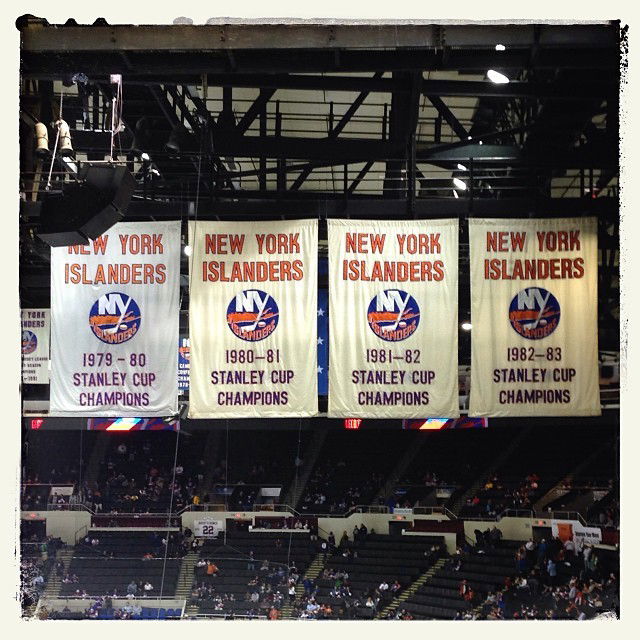 Photo by Swingtastic Toys with the username @swingtastic,  October 18, 2013 at 7:15 PM and the text says 'hynes57:

My son: We won four straight #StanleyCups ? Yes, Aidan we did. #GotCups #islanders  (at Nassau Veterans Memorial Coliseum)

Oh the good ole days #nyislanders'