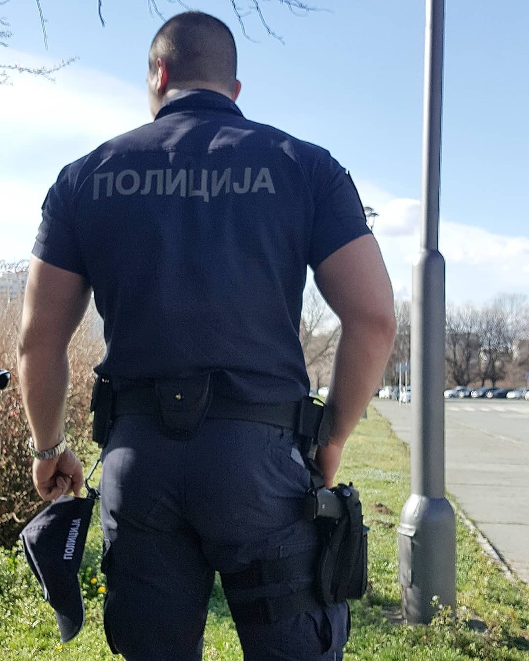 Photo by roughstr8men with the username @roughstr8men,  March 6, 2019 at 10:59 PM and the text says 'Hot ripped Serbian police officer'