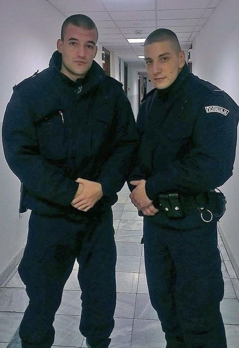 Photo by roughstr8men with the username @roughstr8men,  March 6, 2019 at 11:01 PM and the text says 'Two handsome cops in uniform'