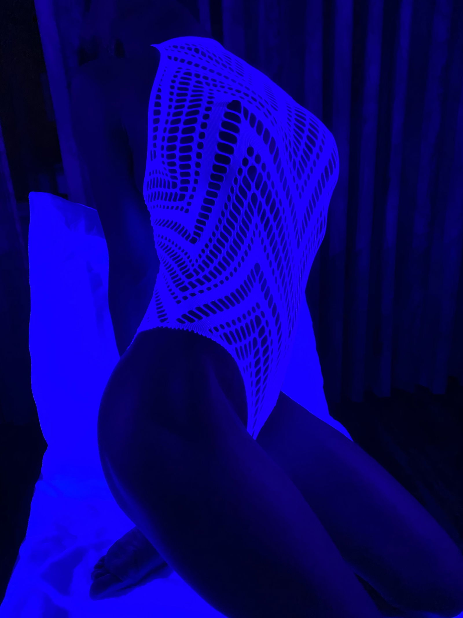 Photo by Takeflight3 with the username @Takeflight3, who is a verified user,  January 15, 2020 at 5:06 AM and the text says 'Bathed in blacklight...the one and only @batgirlskg. I mean...uh damn. My girlfriend is a fucking unicorn'