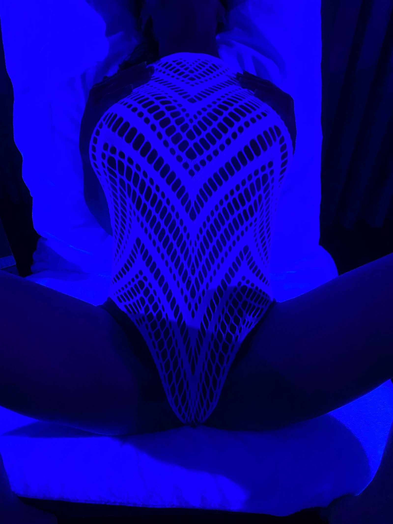 Photo by Takeflight3 with the username @Takeflight3, who is a verified user,  January 15, 2020 at 5:06 AM and the text says 'Bathed in blacklight...the one and only @batgirlskg. I mean...uh damn. My girlfriend is a fucking unicorn'