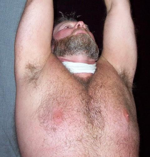 Photo by Hairy Musclebears with the username @hairymusclebears,  April 25, 2019 at 12:01 PM and the text says 'Tiedup Dungeon Bondage Musclebear from USAFUR.com videos #gaygagged #harrystyles #louistomlinson #niallhoran #gay #gaybondage #gaybdsm #kinkygay #kinky #fantasy #gayfantasy #slave #gayslave #kidnapped #gaykidnapped #muscle #perfection #ducttape..'