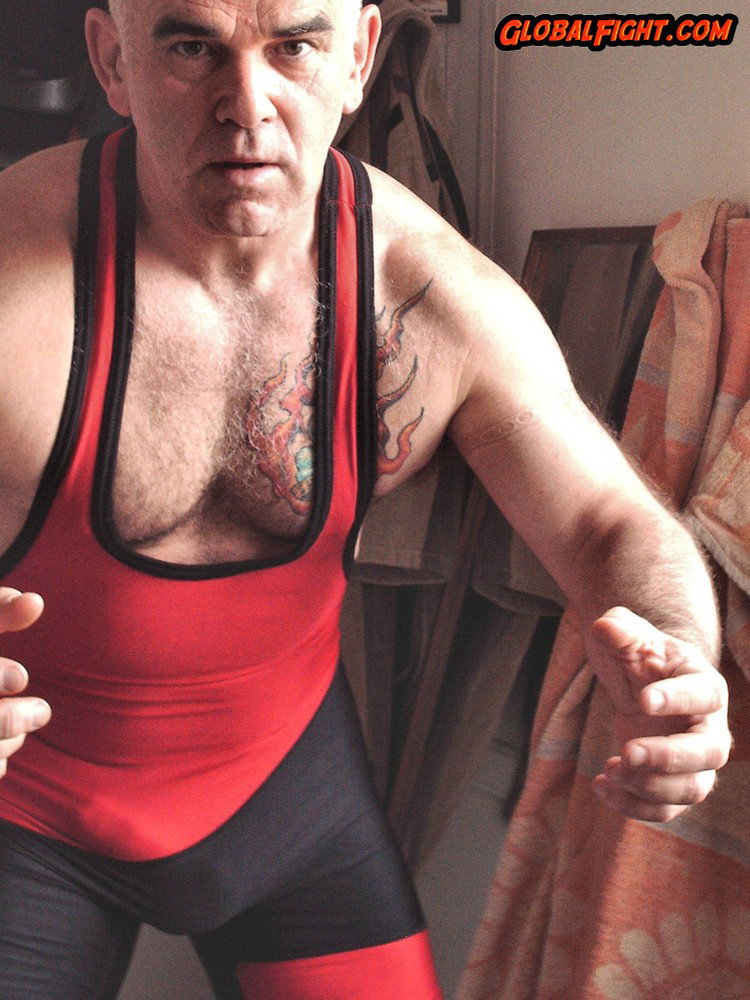 Photo by Hairy Musclebears with the username @hairymusclebears,  March 19, 2020 at 11:58 AM and the text says 'Silverdaddy Singlet Wrestler from GLOBALFIGHT profiles FEEL FREE TO REBLOG #silverdaddy #grandaddy #silverfox #singlet #bulge #gearfetish #gayfetish #fetish #grayhair #oldman #olderman'
