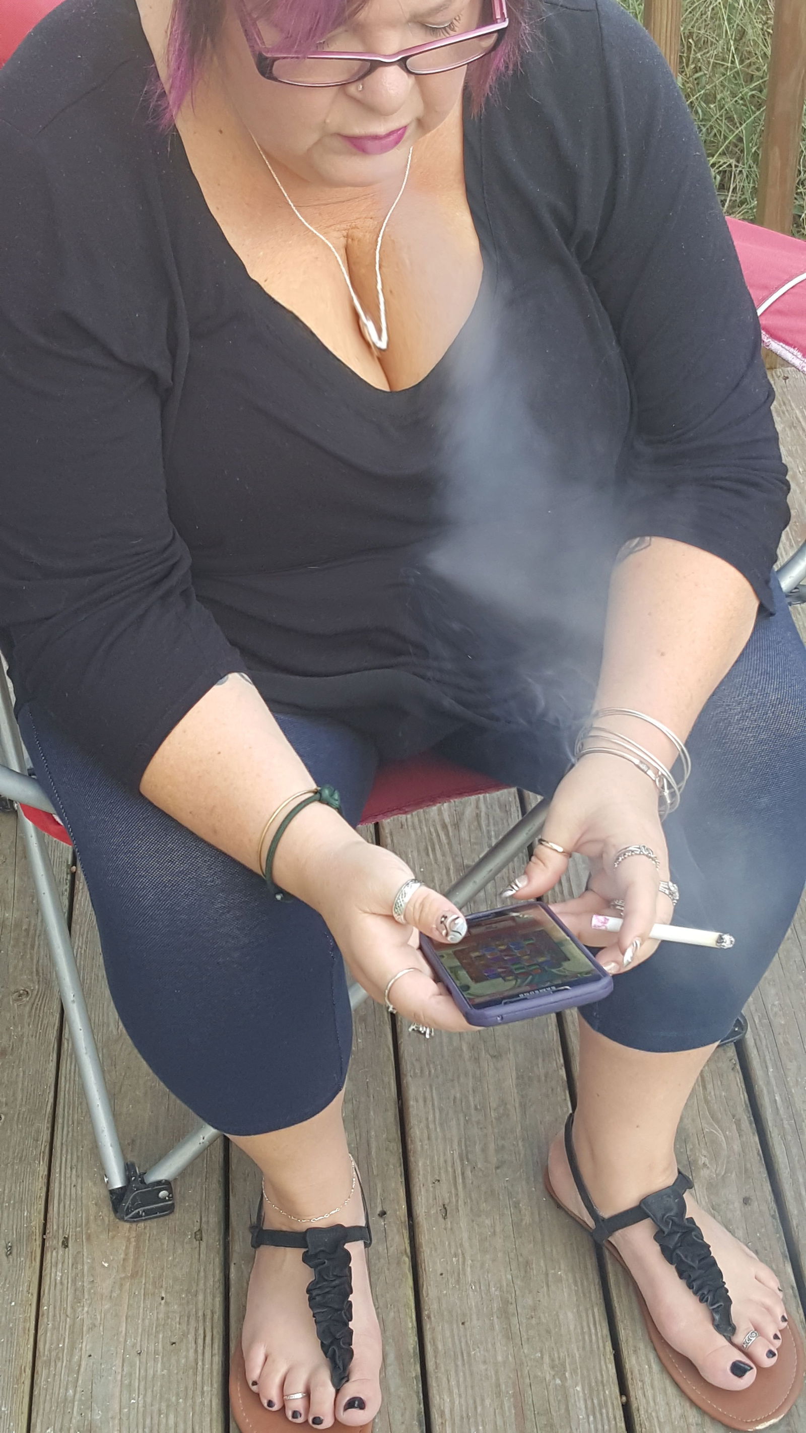 Photo by Dawn42D with the username @Dawn42D,  October 22, 2017 at 2:56 PM and the text says 'For my smoking fans, here&rsquo;s a couple exhale pics with my big soft cleavage ;) #tits  #big  #tits  #smoking  #exhale  #smoking  #fetish  #milf  #cougar  #slut  #wife  #slutty  #bbw  #WVHotBBW  #Dawn42D'