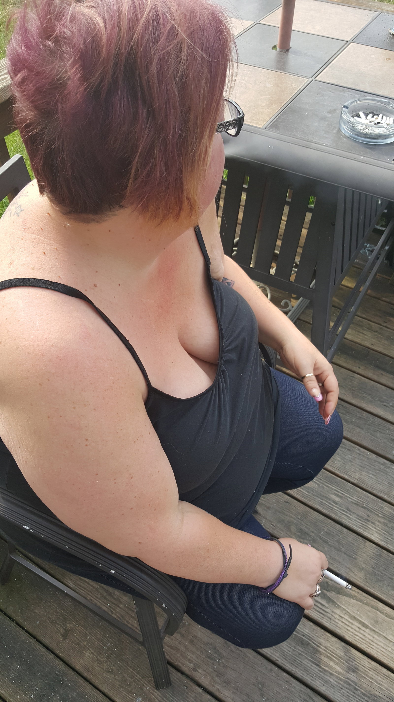 Photo by Dawn42D with the username @Dawn42D,  July 27, 2017 at 10:39 AM and the text says 'Sexy bbw wife having her morning cigarette. Look at her amazing cleavage! #smoking  #smoking  #bbw  #smoking  #wife  #sexy  #downblouse  #unaware  #wife  #smoking  #fetish  #cleavage  #big  #tits  #big  #naturals  #big  #hangers  #cigarette  #smoking..'