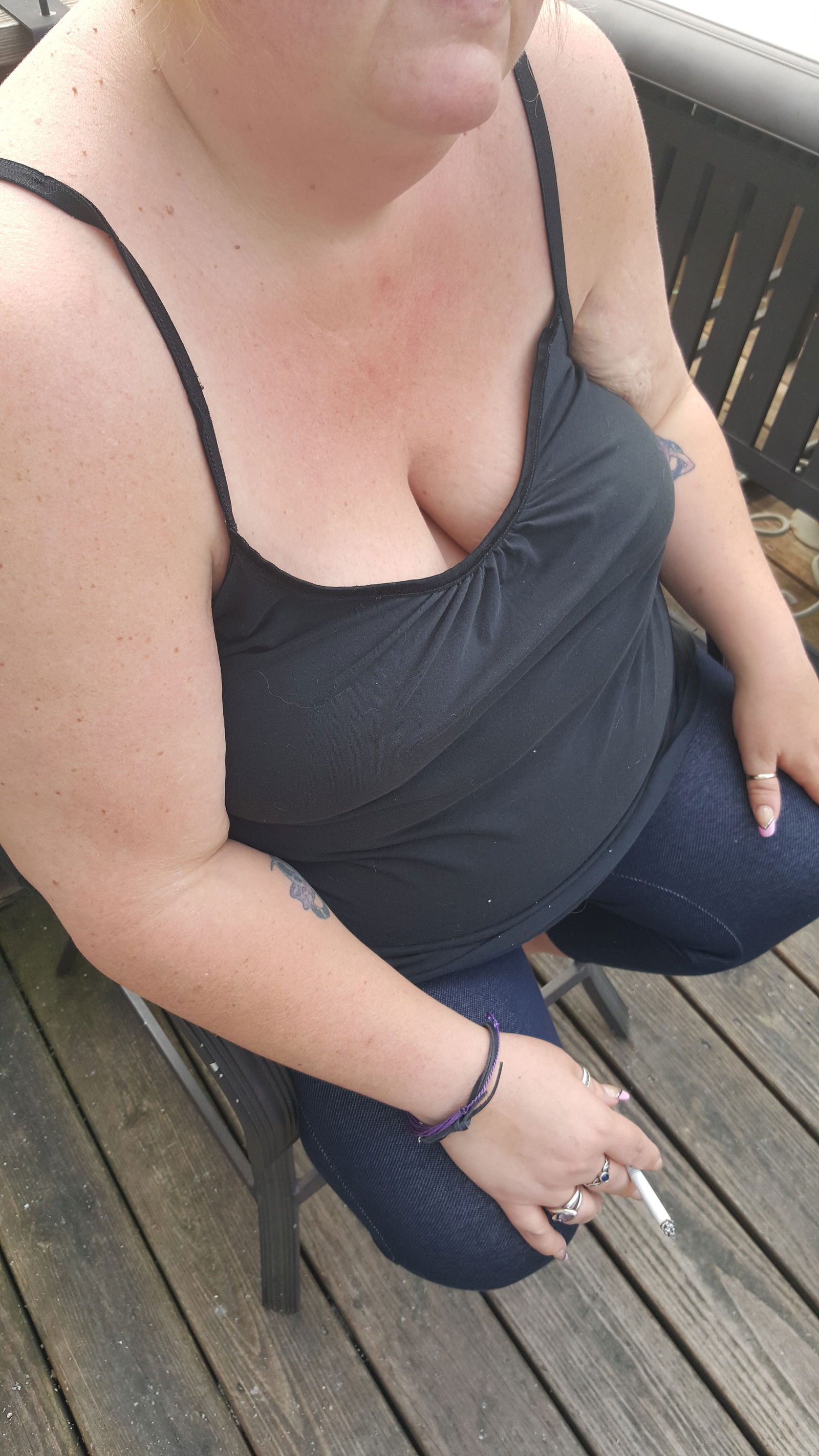 Photo by Dawn42D with the username @Dawn42D,  July 27, 2017 at 10:39 AM and the text says 'Sexy bbw wife having her morning cigarette. Look at her amazing cleavage! #smoking  #smoking  #bbw  #smoking  #wife  #sexy  #downblouse  #unaware  #wife  #smoking  #fetish  #cleavage  #big  #tits  #big  #naturals  #big  #hangers  #cigarette  #smoking..'