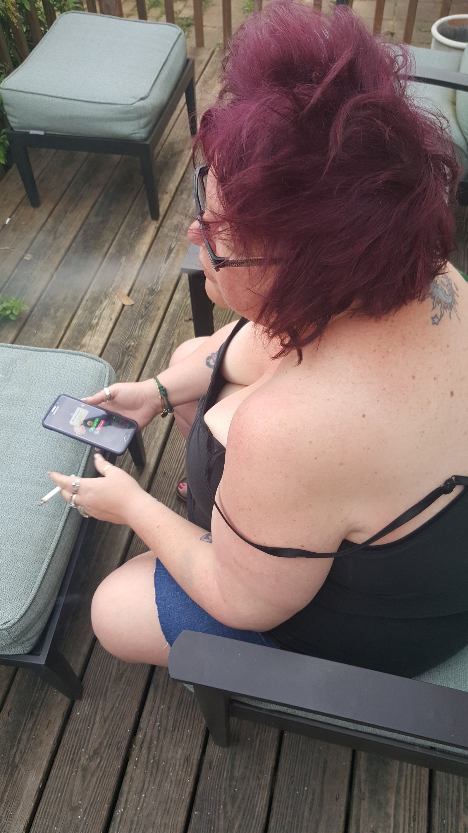 Photo by Dawn42D with the username @Dawn42D,  July 28, 2017 at 1:56 PM and the text says 'I love watching the Mrs smoke. She has some serious sex hair going on in these. #bbw  #bbw  #wife  #smoking  #smoking  #wife  #smoking  #fetish  #cleavage  #downblouse  #unaware  #wife  #sex  #hair  #don't  #care  #WVHotBBW  #wvhb  #Dawn42D'