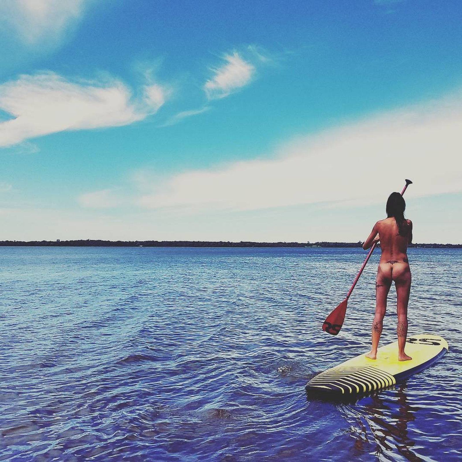 Photo by Captain-LeChene with the username @Captain-LeChene,  October 10, 2017 at 10:22 PM and the text says 'thenaturalsurf:
cheekyventures
Relaxing! #paddleboarding #nüdes #cheekyventures #summer #nakedsport #nudeback #getyournudeon #nudism #outdoornude #outdoornude #getyourassintonature #getyournudeon #sup #tan'
