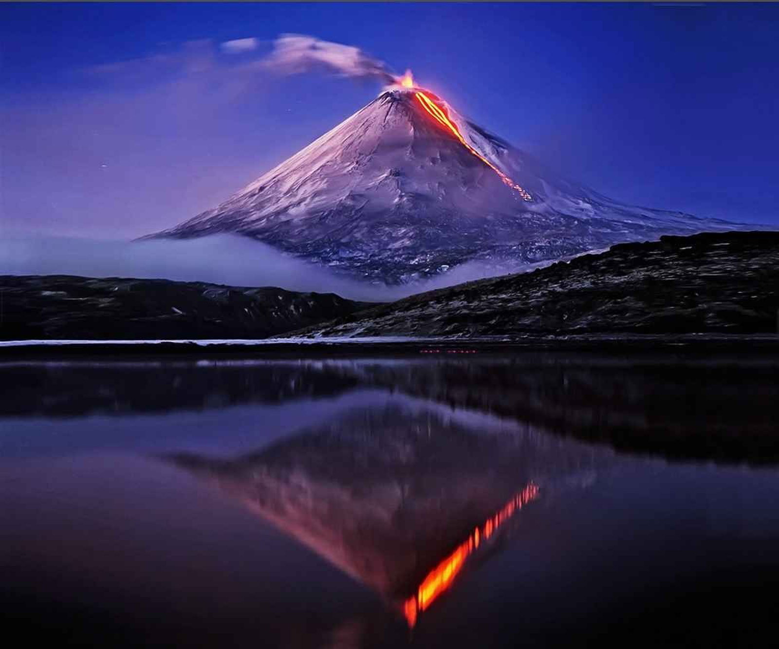 Photo by Firepower with the username @hungrygirls,  January 22, 2014 at 1:02 AM and the text says 'godotal:

Just a Volcano
 #volcano  #lake  #water  #reflections  #blue  #sky  #landscape'