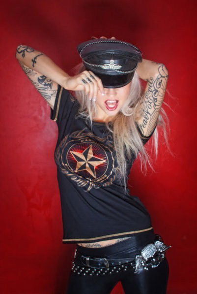 Photo by Sable with the username @SablexXx, who is a verified user,  August 22, 2011 at 6:08 PM and the text says '#Inked  #Doll  #tattoo  #tattooed  #ink  #envy'