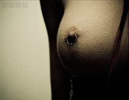 Photo by Sable with the username @SablexXx, who is a verified user,  October 1, 2011 at 5:56 AM and the text says '#piercing  #boobs  #tits  #peitos  #captive'