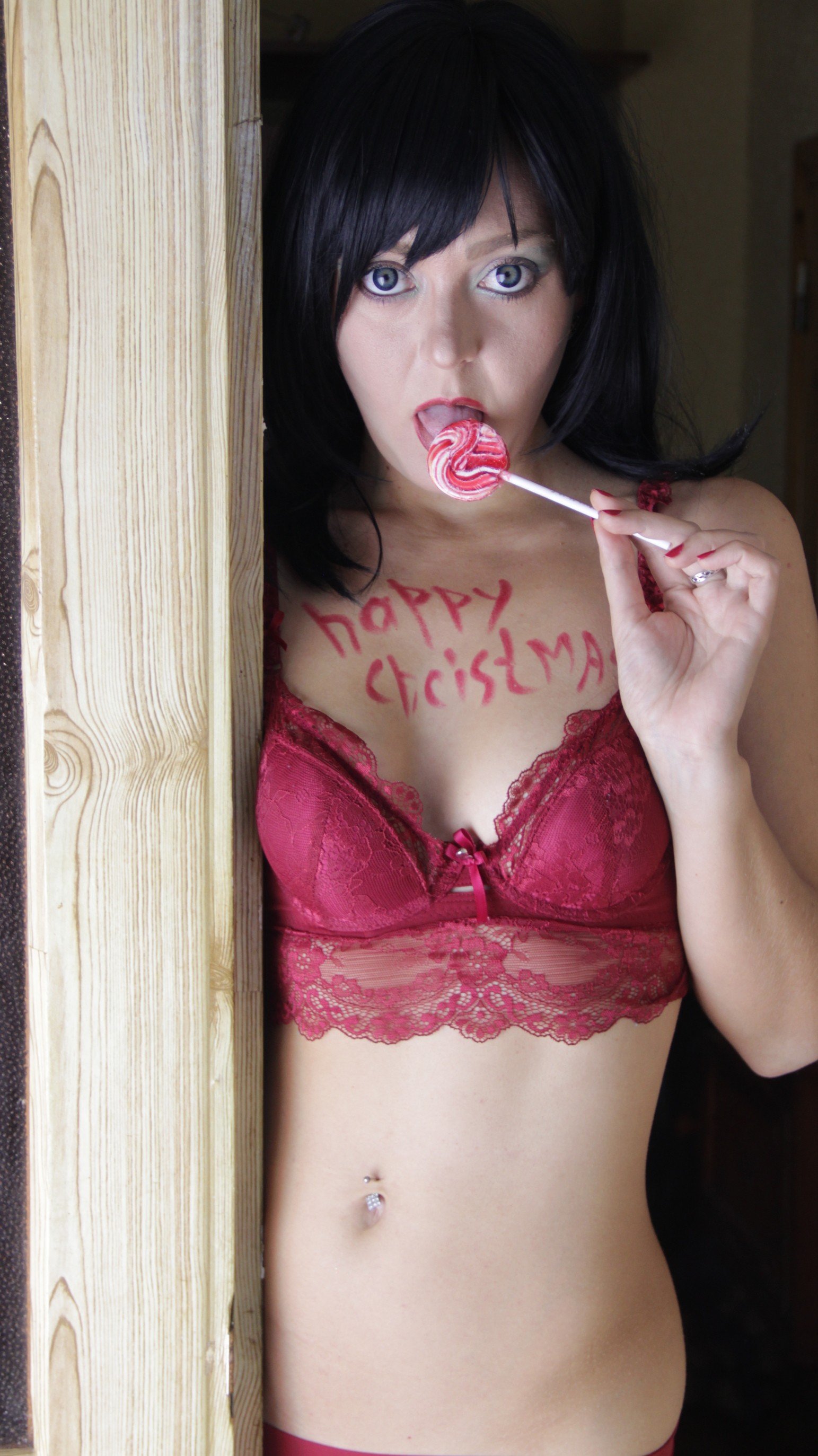 Photo by HomeGrownVideo with the username @HomeGrownVideo, who is a brand user,  December 21, 2019 at 10:20 PM and the text says 'Happy christmas to all ;) #merrychristmas #sexygirl #naughty #redlingerie #lollipop #lickinglollipop #brunette #brunettegirl #holidaycheer Enjoy more at www.homegrownvideo.com'