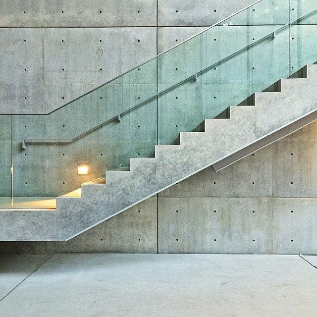 Photo by imaginett with the username @imaginett, who is a verified user,  May 13, 2014 at 9:33 PM and the text says 'archdaily:

Beautiful #concrete stair at 21_21 Design Sight by #TadaoAndo  #architecture #archdaily #tokyo #instagood #iphonesia #tokyo #pritzkerprize #museum (at 21_21 DESIGN SIGHT)'