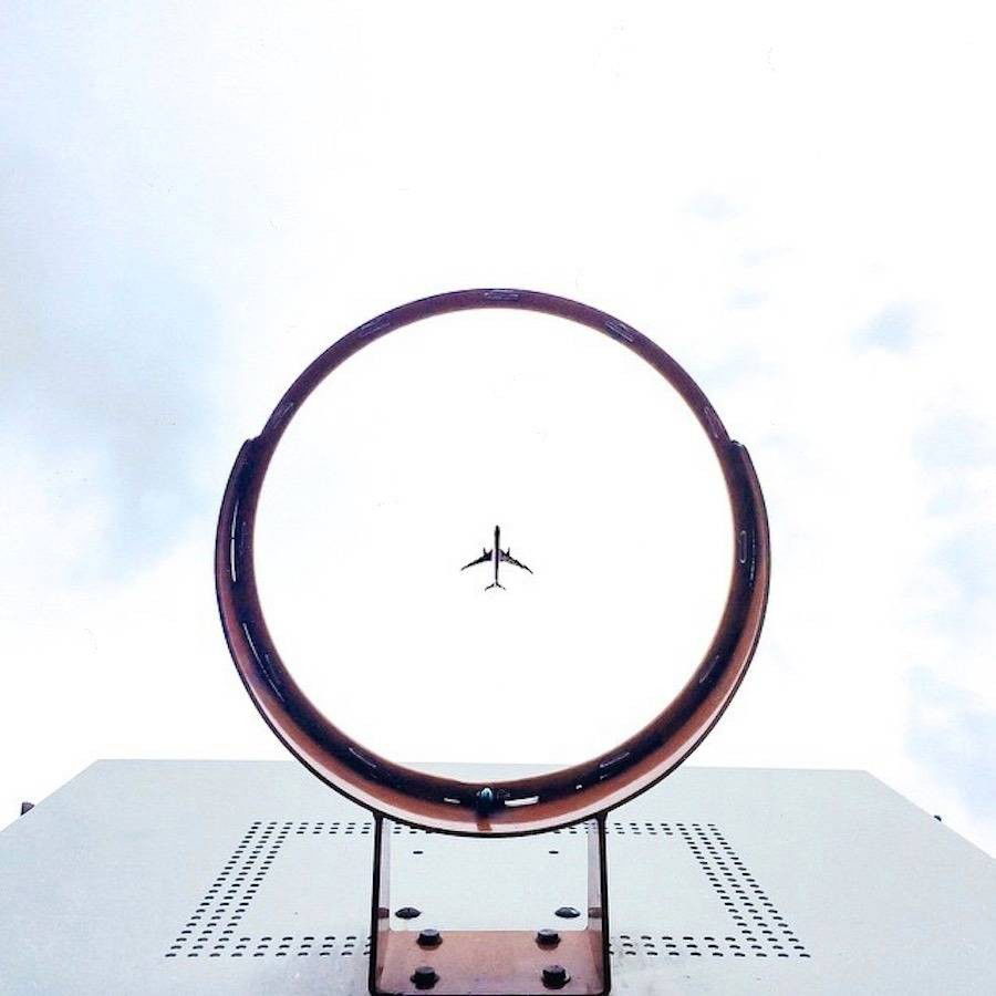 Photo by imaginett with the username @imaginett, who is a verified user,  June 30, 2015 at 9:20 PM and the text says 'thxmxs:

#plane #hoop #sky via www.thrd.co/t/y6yldcbkfR'