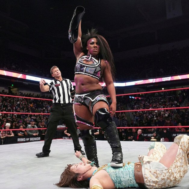 Photo by Ruinedcarpet with the username @Ruinedcarpet,  July 25, 2023 at 10:21 AM. The post is about the topic Women of wrestling and the text says 'Athena.

#Athena #AfricanAmerican #ProWrestler #AEW #Ebony #Babe #Clothed #AllEliteWrestling #ROH #BlackGirl #Boots #WrestlingGear #Brunette #AEWWrestling #RingOfHonor #WomensWrestling #BlackWoman #ROHWrestling #ProWrestling'