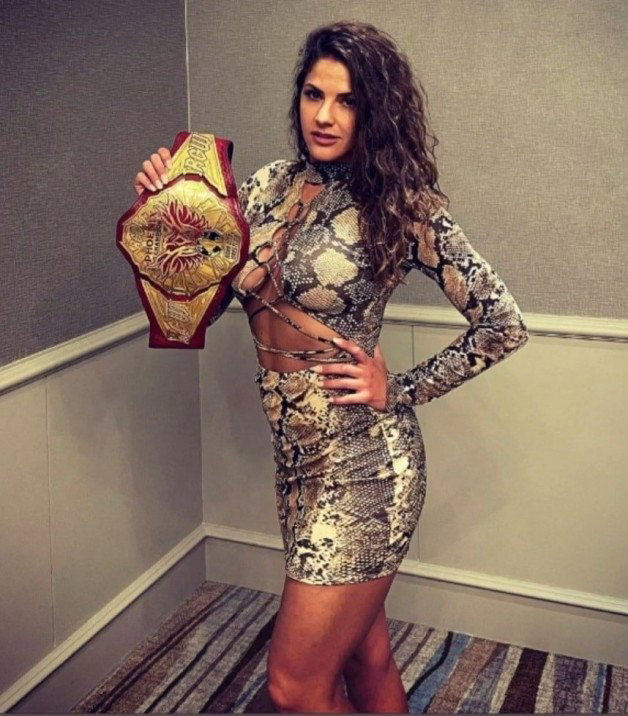Photo by Ruinedcarpet with the username @Ruinedcarpet,  March 3, 2024 at 12:02 PM. The post is about the topic Women of wrestling and the text says 'Christi Jaynes.

#ChristiJaynes #ProWrestler #Latina #Brunette #Clothed #Dress #Brazilian #Possing #WomensWrestling #Photoshoot #ProWrestling'