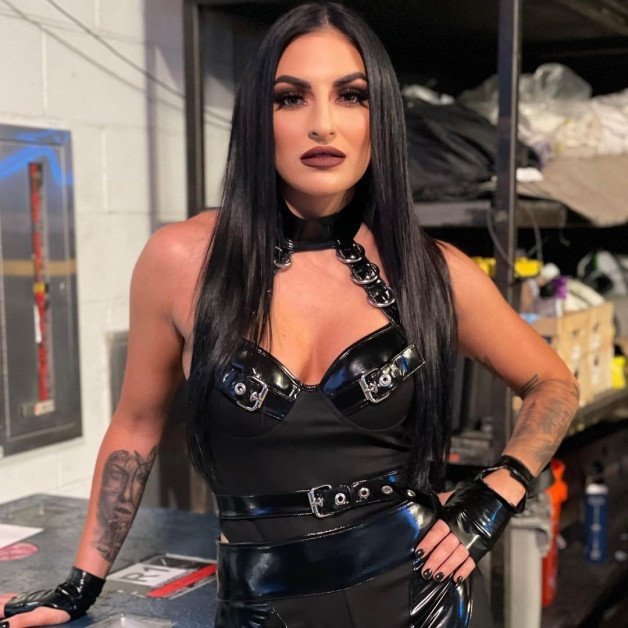 Photo by Ruinedcarpet with the username @Ruinedcarpet,  June 8, 2022 at 6:38 PM. The post is about the topic Women of wrestling and the text says 'Sonya Deville.

#SonyaDeville #Hot #ProWrestler #Babe #BlackClothes #Goth #Dark #WrestlingGear #Restraints #Makeup #DarkHair #Tattoo #Gothic #Ink #BlackNails #GoodOlNewAge #Hottie #GothGirl #DarkGirl #Domina #Eyeliner #Beauty #Gorgeous #Brunette..'
