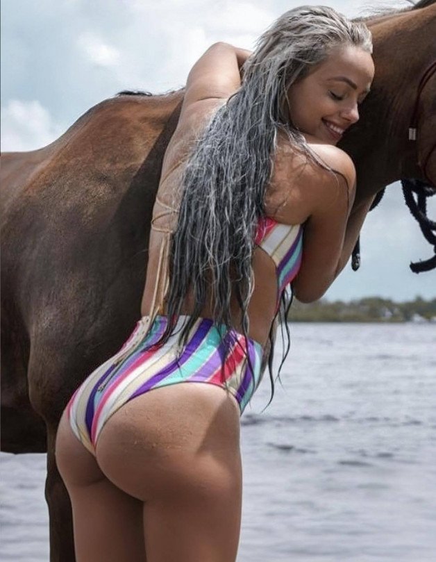 Photo by Ruinedcarpet with the username @Ruinedcarpet,  December 14, 2023 at 10:19 AM. The post is about the topic Women of wrestling and the text says 'Liv Morgan.

#LivMorgan #ProWrestler #WWE #Swimwear #Hippie #Horse #Swimsuit #WomensWrestling #ProWrestling'
