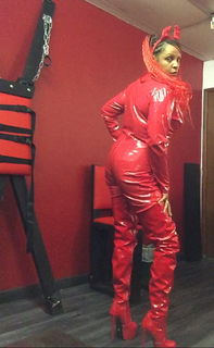 Photo by MistressMD with the username @MistressMD, who is a star user,  October 30, 2020 at 6:49 PM and the text says 'Head to toe in #Red and #PVC 

I am that Devilish Bitch 

And have captured a couple of special lil #clips, of me undoing BOTH of my zips 

#FemDomme #EbonyDomme #FinDomme #Wrestler #FetishModel #ContentCreator

Tip, like and share if you love..'