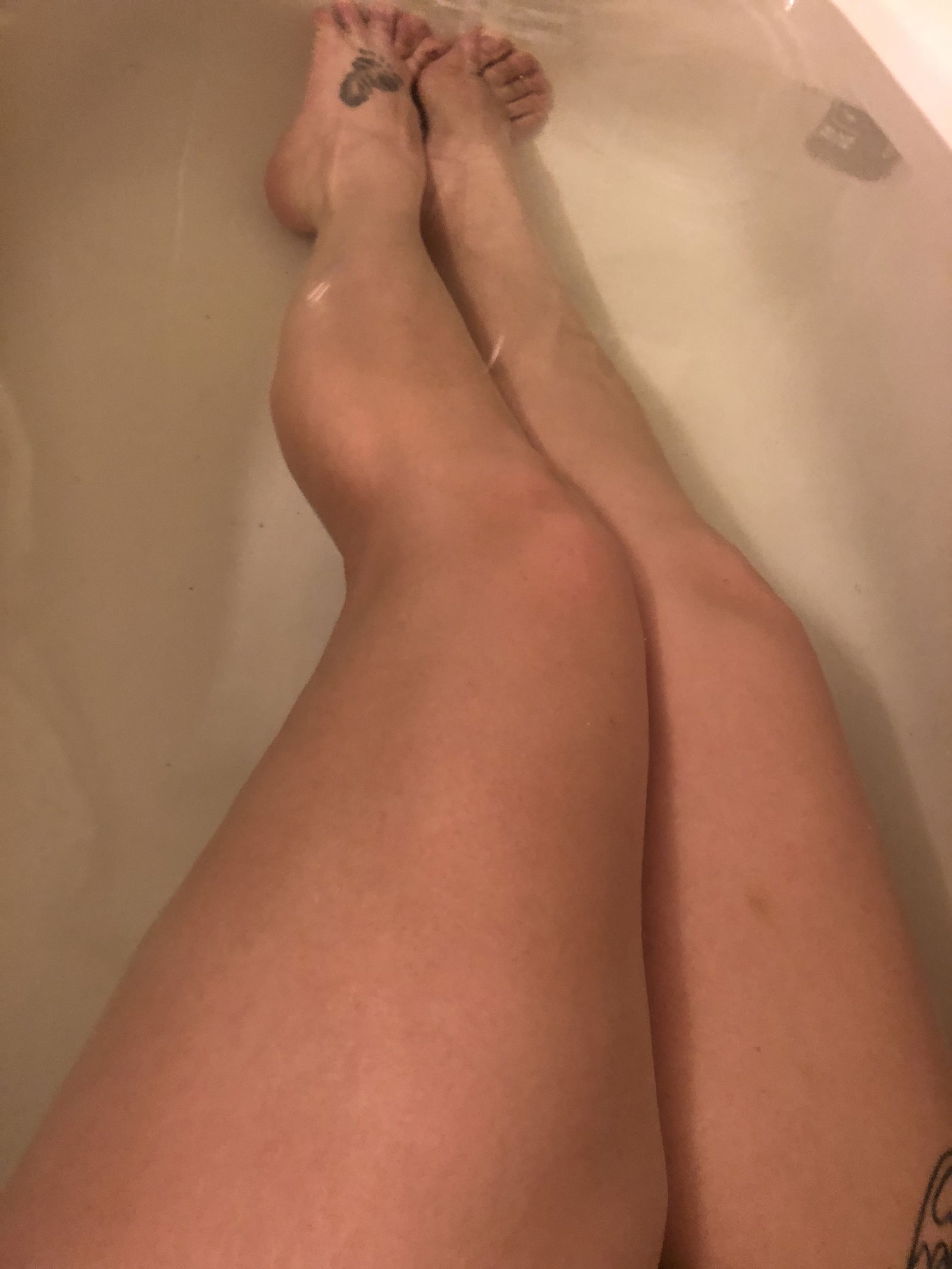 Photo by Sexylexy84 with the username @Sexylexy84,  November 28, 2019 at 1:57 AM. The post is about the topic Just the legs and the text says 'ahhhh relaxing after a long busy day! who is ready to rub me down?! 😇😬'