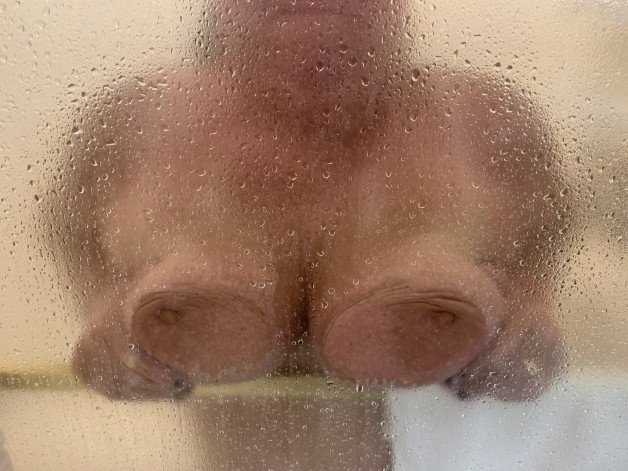 Photo by Johnsfunplace with the username @Johnsfunplace, who is a verified user,  August 1, 2023 at 6:35 PM and the text says 'Wife teasing me through shower'