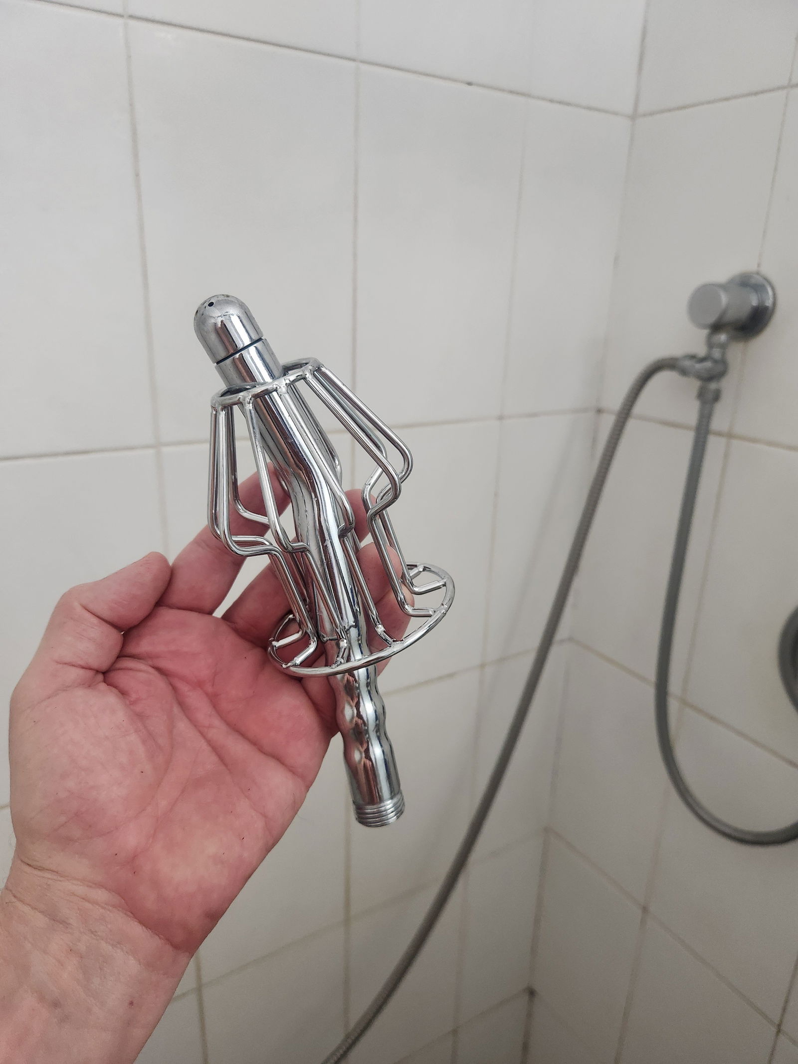 Album by RustyLawrence. with the username @RustyLawrence,  April 10, 2024 at 12:25 PM. The post is about the topic Anal stretching and the text says 'New steel tunnel plug and the shower shot fits through for great cleaning'