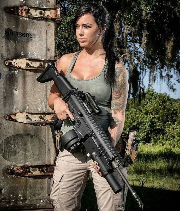 Photo by Senorpunisher with the username @Senorpunisher,  July 23, 2019 at 4:20 AM. The post is about the topic Girls with Guns