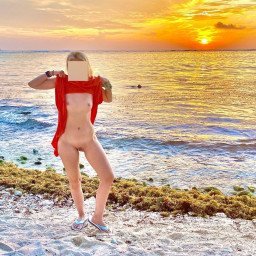 Explore the Post by Sunny and Lightning with the username @SunnyLightning, posted on May 11, 2023. The post is about the topic Beach Girls. and the text says 'Fun in the sun at sunrise'