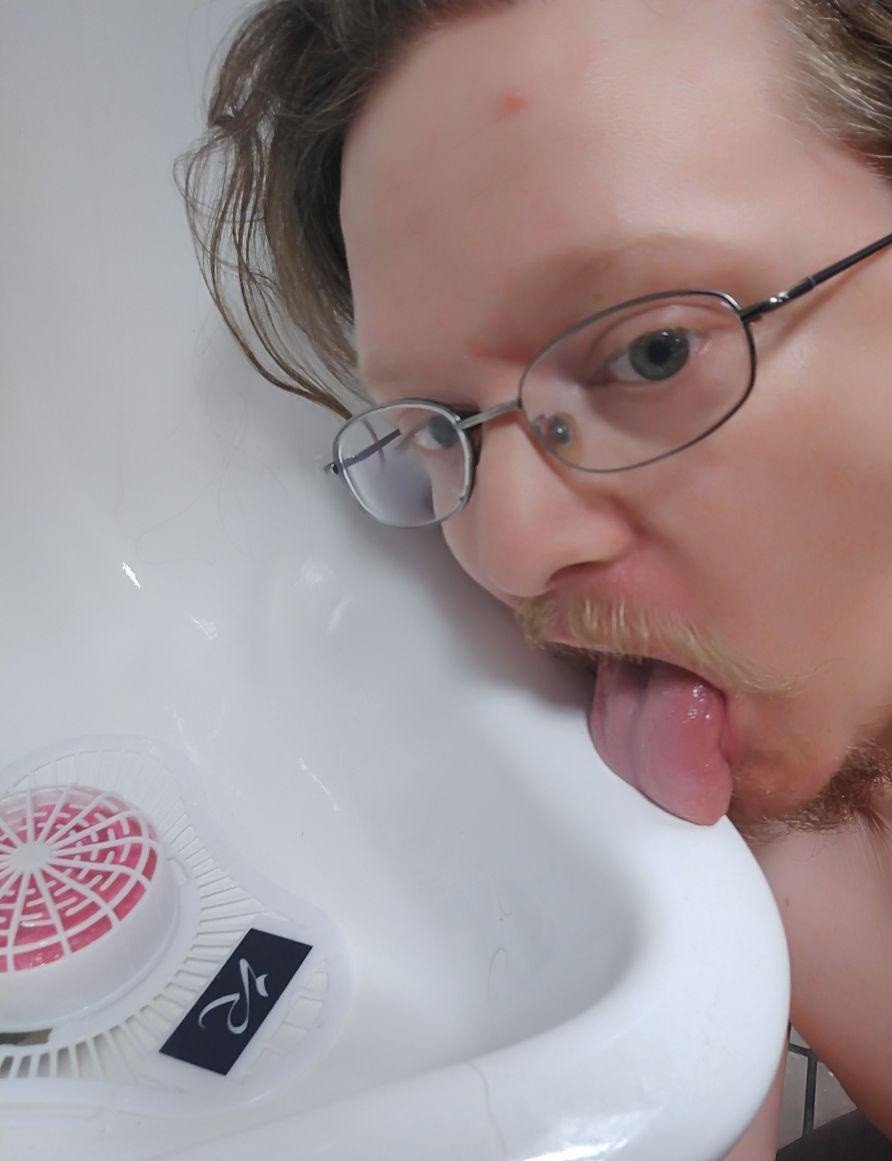 Photo by cdroxxy with the username @cdroxxy,  August 9, 2019 at 12:08 AM. The post is about the topic Toilet Humiliation and the text says 'Licking the public urinal about 30 seconds after watching through the stall crack as some guy used it. Some of the droplets were still warm on my tongue'