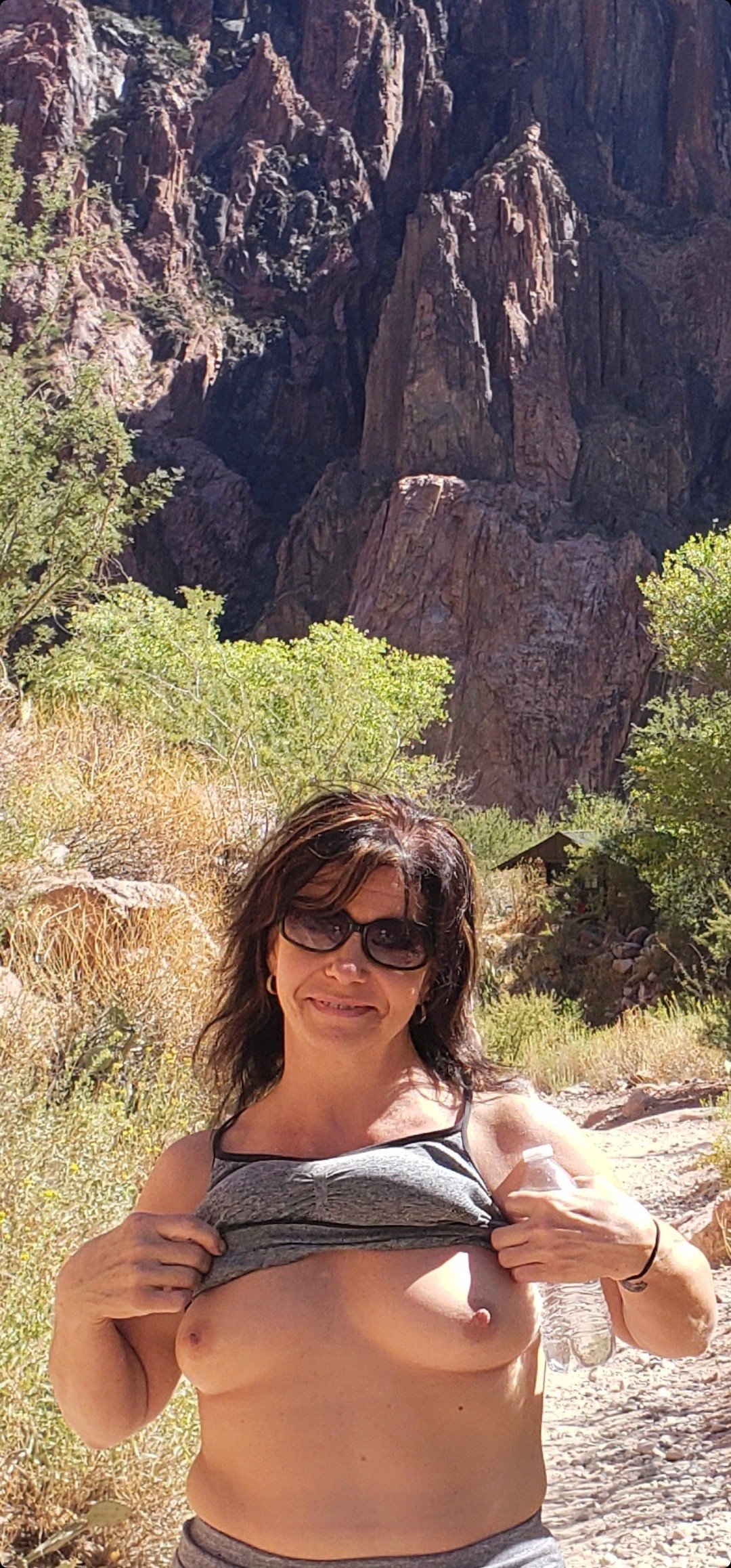 Photo by Sixfive with the username @Sixfive, who is a verified user,  August 12, 2022 at 3:08 PM. The post is about the topic Great Outdoors and the text says 'My wife @Blueeyes13 all over Arizona. We love the great outdoors'