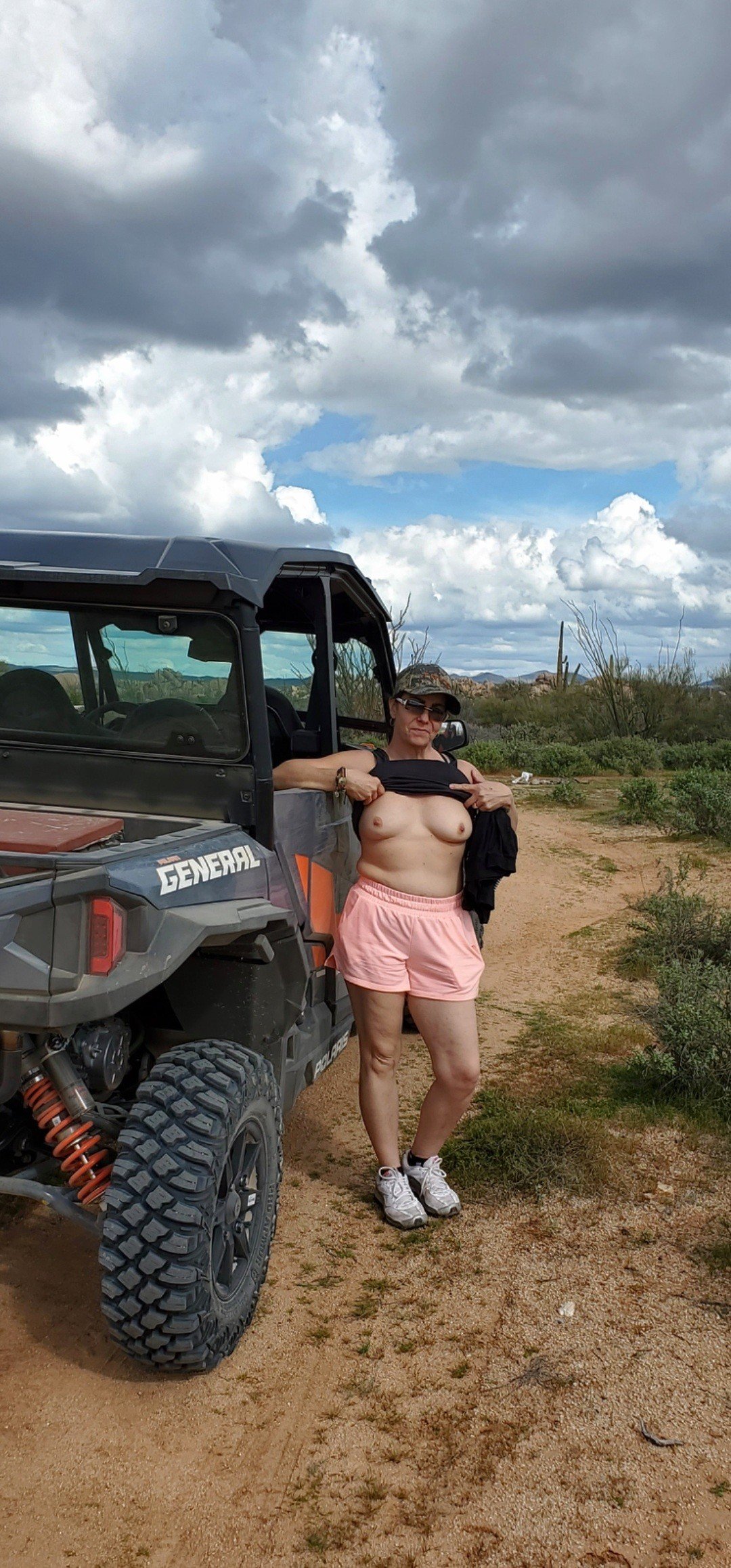 Photo by Sixfive with the username @Sixfive, who is a verified user,  August 12, 2022 at 3:08 PM. The post is about the topic Great Outdoors and the text says 'My wife @Blueeyes13 all over Arizona. We love the great outdoors'