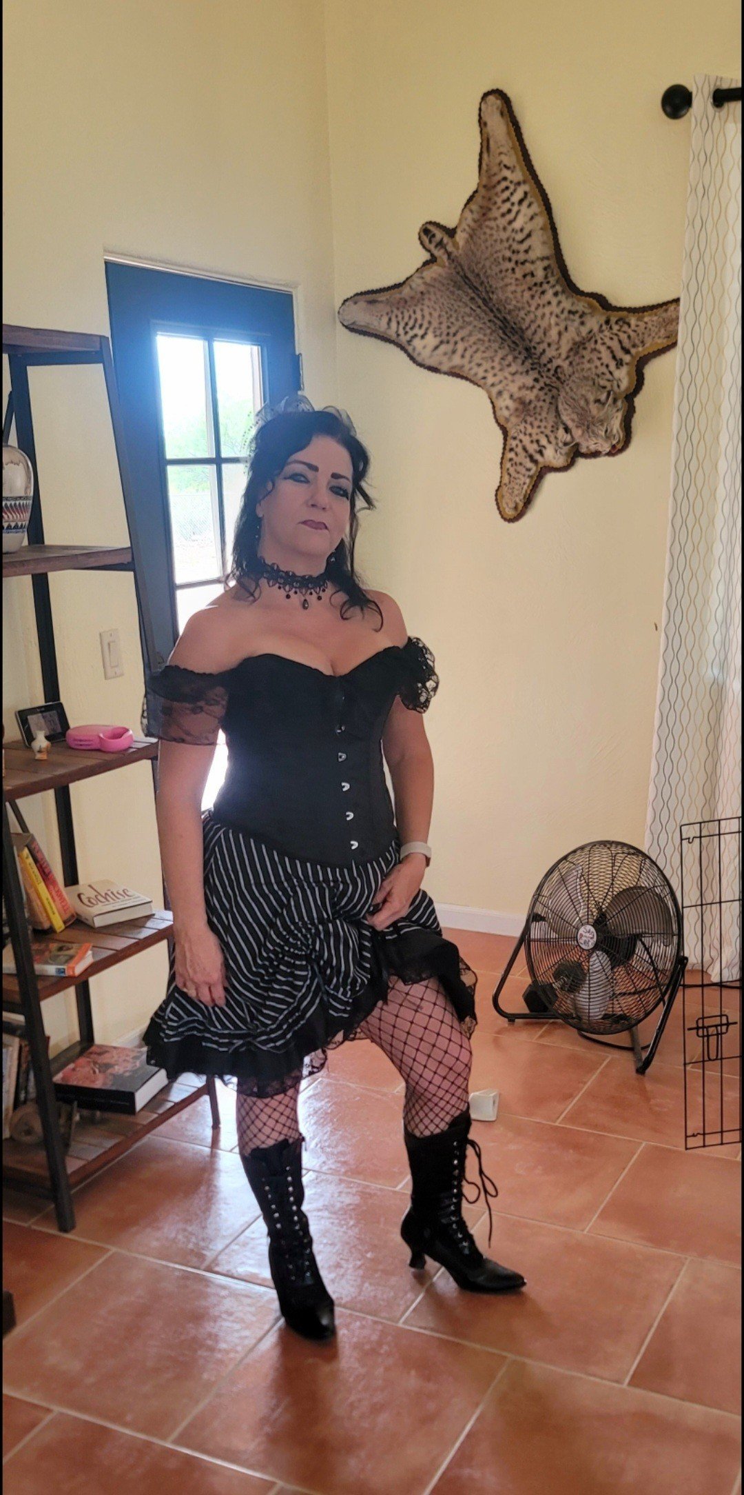 Photo by Sixfive with the username @Sixfive, who is a verified user,  June 18, 2022 at 9:47 PM. The post is about the topic MILF and the text says '"Honey do I look ok in this?"
Hell yes you do baby! My wife @Blueeyes13 getting ready for work in Tombstone Az'
