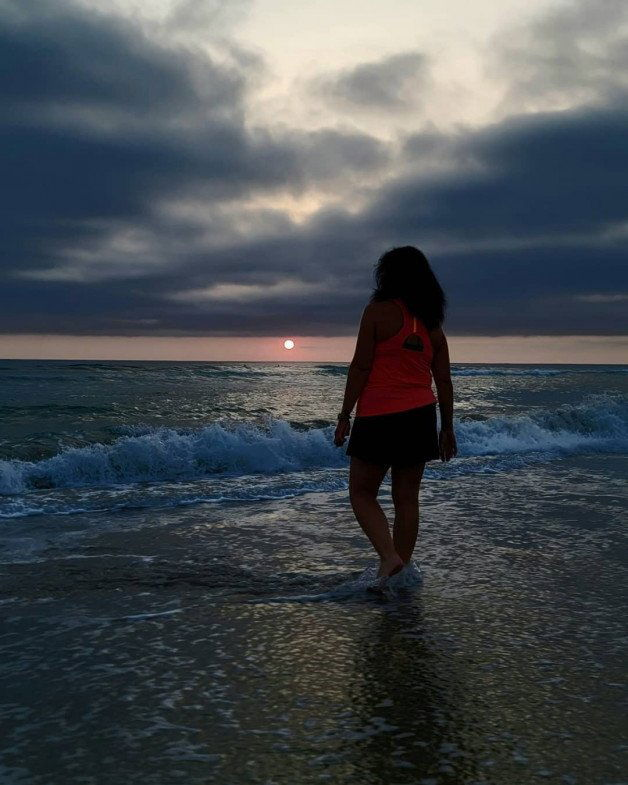 Photo by Sixfive with the username @Sixfive, who is a verified user,  July 15, 2021 at 1:53 AM. The post is about the topic Landscape scenery and the text says 'My wife on the beach in San Diego'