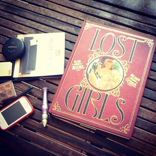 Photo by topjames with the username @topjames,  June 8, 2013 at 9:26 PM and the text says 'finally reading this now.  this is a delightfully dirty book! #alan  #moore  #lost  #girls'