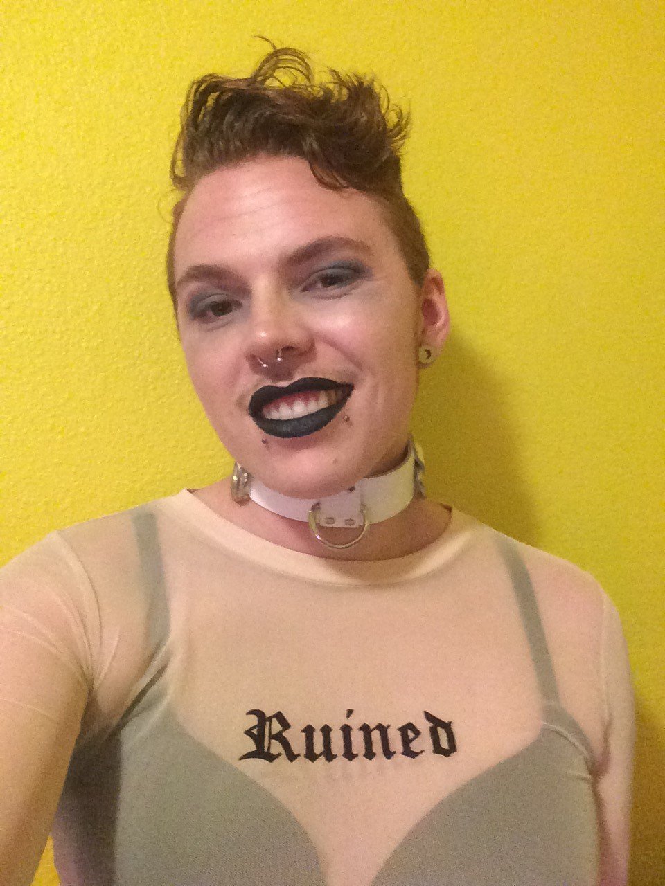 Photo by feraleffingdog with the username @feraleffingdog,  December 2, 2018 at 11:17 PM and the text says 'First time I went sans glasses to a party because my eye makeup was so good. What a Look THEY/THEM #transgenderporn #genderqueer #makeup #piercings #mesh'