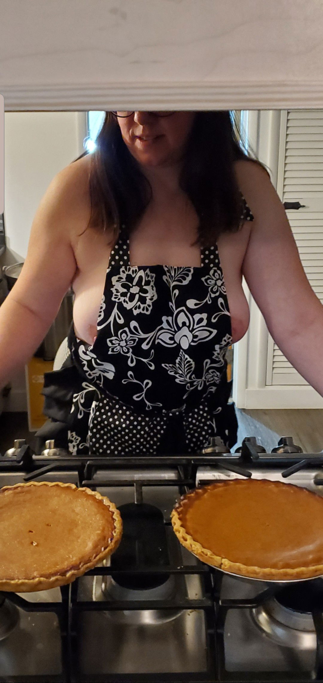 Photo by Lovenestpeople with the username @Lovenestpeople,  December 2, 2019 at 1:59 AM and the text says 'My friend came over for some pumpkin pie, i dared my girl to just wear the apron.  She was happy to oblige'