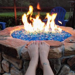 Photo by SexWithMilfStella with the username @SexWithMilfStella, who is a star user,  April 2, 2024 at 10:00 PM. The post is about the topic Foot Fetish and the text says '“The difference between a good life and a bad life is how well you walk through the fire.” – Carl Jung #stellahere #petite #smallfeet #cutefeet #paintedtoenails #tattoo #fire #flames'