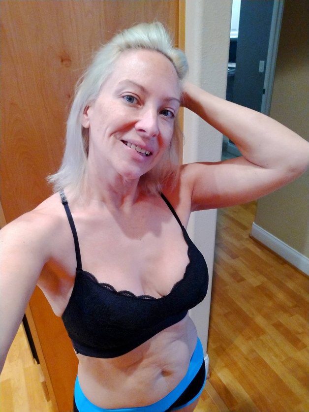 Photo by SexWithMilfStella with the username @SexWithMilfStella, who is a star user,  March 15, 2022 at 12:00 PM. The post is about the topic MILF and the text says 'Do Blondes really have more fun? #milfstella #milf #mature #cougar #girlnextdoor #petitebody #hotmom #blonde #blueeyes #ddds #bootyshorts #blackbra'