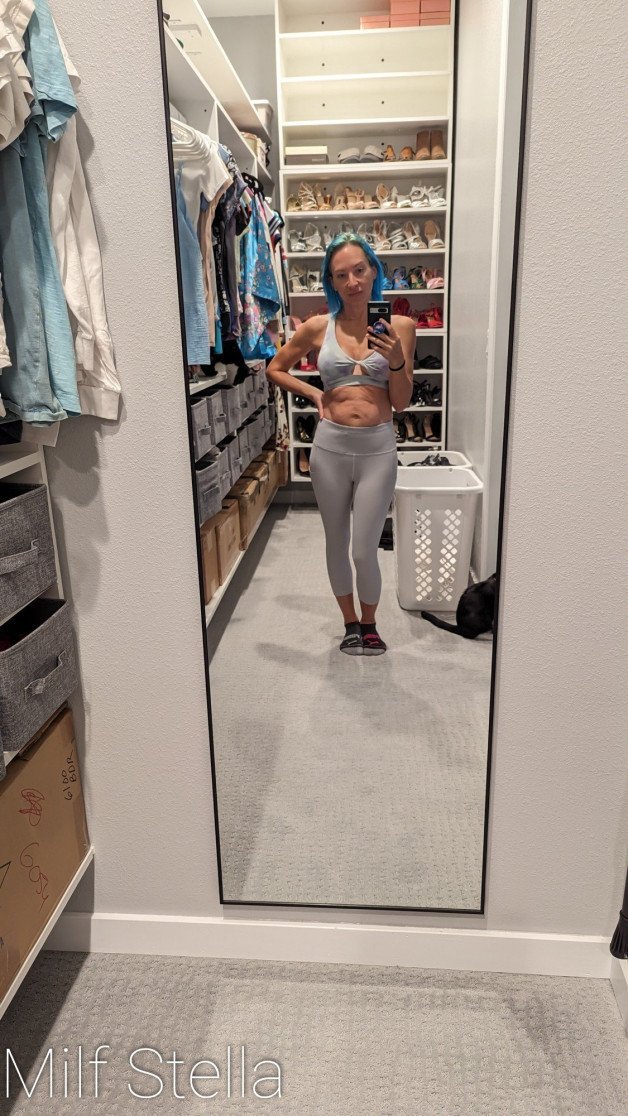 Photo by SexWithMilfStella with the username @SexWithMilfStella, who is a star user,  December 30, 2023 at 12:55 PM and the text says 'When the cat interrupts your selfie! #stellahere #petite #blueeyes #bluehair #yogapants'