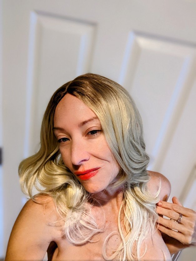 Photo by SexWithMilfStella with the username @SexWithMilfStella, who is a star user,  May 1, 2022 at 10:50 AM. The post is about the topic MILF and the text says 'Who's that girl? #milfstella #milf #mature #cougar #girlnextdoor #blonde #blondewig #blueeyes #purplehair #mysterygirl #redlips'