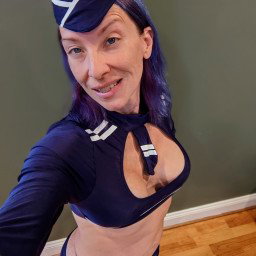 Photo by SexWithMilfStella with the username @SexWithMilfStella, who is a star user,  November 18, 2022 at 12:50 PM. The post is about the topic Cosplay and the text says 'Please fasten your seatbelts. This is going to be a bumpy flight! #milfstella #milf #altmilf #mature #cougar #girlnextdoor #hotmom #hotwife #petite #costume #cosplay #flightattendant #buckleup'