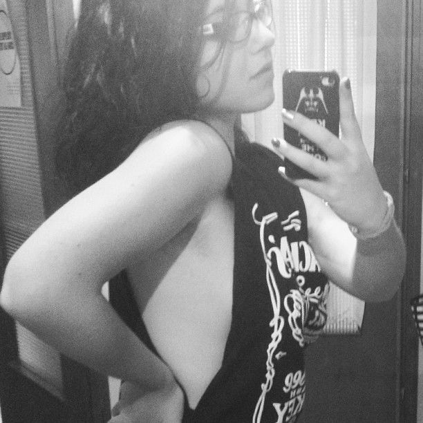 Photo by MaxvJ with the username @MaxvJ,  June 22, 2013 at 1:38 PM and the text says '#?  #alcohol  #iphone  #b/w  #beauty  #jack  #daniel's  #girl  #rock  #n  #roll  #me  #italian  #beauty  #italy  #wasted  #ripped'