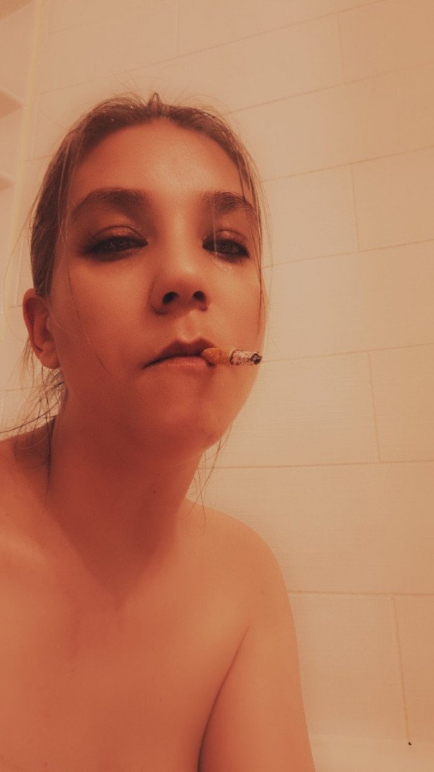 Photo by ValerieRayne with the username @ValerieRayne, who is a star user,  June 29, 2024 at 5:34 AM and the text says 'Do you like when I smoke it down to the filter?

#smoking #smokingfetish #bathtime #brunette #sexy #sensual #cigarette'