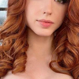 Photo by Lauren with the username @Laurenn,  April 16, 2024 at 7:26 AM. The post is about the topic Beautiful Redheads and the text says '#amouranth'