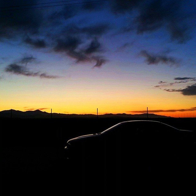 Photo by misfetiches with the username @misfetiches,  October 14, 2013 at 6:19 AM and the text says 'naterisch:

#Sunset on my drive home after a #SundayFunday at #LagunaSeca with @BMWUSA. Love how the remaining #sunlight creates a sweet #silhouette of my @bmw #M3!'