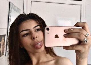 Album by Tributemypicslut with the username @Tributemypicslut,  March 8, 2020 at 2:25 PM and the text says '#cumtribute'