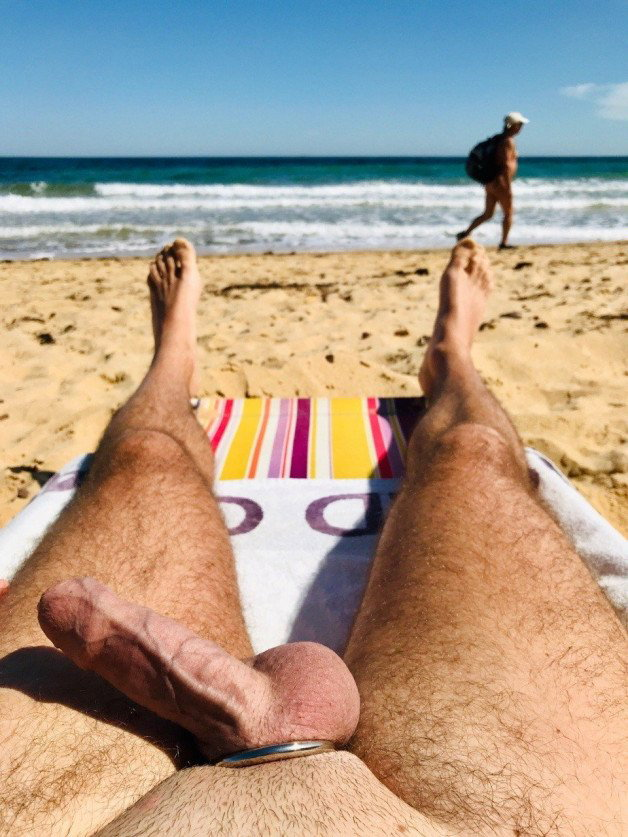 Photo by OzNudeUncut with the username @OzNudeUncut, who is a verified user,  July 30, 2022 at 8:40 PM. The post is about the topic Gay nude beach and the text says 'Would you be able to walk by without stopping to say hello? 🤔 
#beachboner #gaynudebeach #nudistmen #exhibitionist'