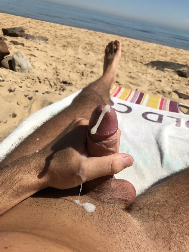 Photo by OzNudeUncut with the username @OzNudeUncut, who is a verified user,  April 20, 2022 at 1:21 AM. The post is about the topic Nude Beach and the text says 'Flying cum - take cover!
#cum #cumshot #nudebeach #exhibitionist'